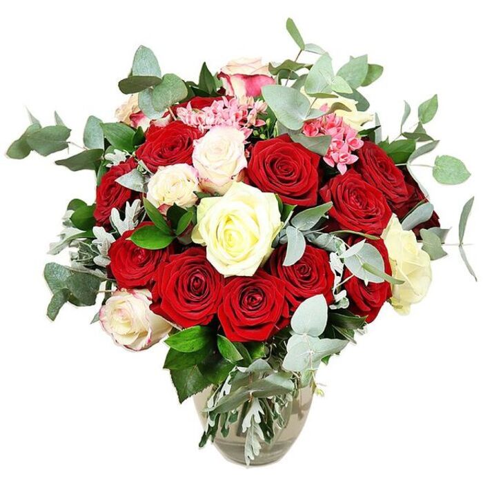 A sumptuous bouquet of mixed roses rests in a clear glass vase, photographed against a bright white background that makes every shade and curve stand out. The flowers form a generous, rounded dome, anchored by numerous deep red and scarlet roses whose velvety petals create a sense of warmth, intensity, and long-lasting affection. Some red blooms are tightly furled, hinting at promises yet to unfold, while others are wide open, their hearts visible and plush. Intertwined are creamy white and soft ivory roses, several tinged at the edges with the palest blush pink, bringing luminosity and a sense of calm balance to the passionate reds. Between the larger heads, clusters of small, bright pink filler blooms introduce playful highlights and a fine, feathery texture, reminiscent of the delicate flowers you might see in garden borders around Headington or along the river walks near Iffley. Arc-shaped stems of eucalyptus weave throughout the arrangement, their blue-green, coin-shaped leaves adding a contemporary touch and suggesting a cool, refreshing fragrance. Supporting dark green foliage and hints of silvery-green leaves help to fill out the design, giving it substance without overwhelming the roses. The clear glass vase has a softly bulbous bottom tapering into a narrower neck, clearly showing the neatly trimmed stems and the clean water that keeps them fresh, as if ready to be placed on a mantelpiece in an Oxford townhouse. The lighting is soft yet bright, throwing no harsh shadows, and the overall mood is one of polished elegance and thoughtful romance, suitable for anniversaries, Valentine's surprises, or meaningful celebrations across Oxford.