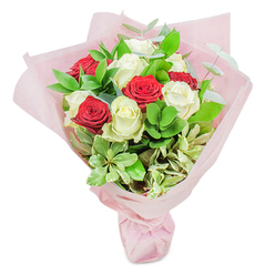 Displayed against a clean white background, this lush and romantic bouquet shines with the natural beauty of Oxford's floristry tradition. At its heart, a balanced pairing of deep red and elegant white roses-each bloom perfectly spiraled and kissed by freshness-reflect the tender contrasts of Oxford's own blend of old-world grandeur and youthful energy. Interspersed amongst the roses, a vibrant selection of greenery adds volume and movement: dark ruscus gives a grounding effect, while rounded and delicately marbled leaves lift the bouquet with lightness and variety. Eucalyptus sprigs contribute a silvery-green softness and a refreshing aroma evocative of morning walks through University Parks. Every detail, from the silky, full petals to the pastel pink, multi-layered gift wrapping at the stem, speaks of thoughtful craftsmanship and a passion for floral artistry found at trusted Oxford flower shops. The gentle pink tones of the wrapping add a dreamy, romantic finish, enhancing each rose's natural charm. Whether shared as a gesture of appreciation for a friend in Summertown, offered as a heartfelt anniversary surprise, or given to mark a moment of congratulations, this bouquet is a poetic embodiment of emotion, local connection, and timeless botanical beauty-each detail thoughtfully designed to bring joy to every recipient across Oxford.