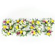 A carefully crafted floral tribute spells the word BEST in four bold, capital letters, each letter densely packed with a garden of fresh blooms and verdant fronds against a pristine white background. Up close you can see the texture: large, multi-petaled white chrysanthemum-like flowers form soft, cloud-like cushions; sunny yellow roses and gerbera daisies lift the palette with buttery warmth; small clusters of deep purple lisianthus or similarly shaped blooms add a respectful, quiet depth; and lively sprays of magenta-pink spray roses or carnations give pinpricks of joyous colour. Interspersed throughout are tiny pale green and ivory filler flowers that add delicate texture and a hint of meadow-sweet scent, while glossy dark green fern fronds trace the outside edges of each letter, softening the typography with natural curves. A subtle dark-green metal framework peeks through in places - along the horizontal bar of the E and through tighter gaps - revealing the careful armature that keeps the letters firm for viewing at a funeral chapel or memorial hall. The composition is photographed straight-on in bright, even light so every petal surface and leaf vein reads clearly, evoking freshness and meticulous handwork. The overall impression is one of thoughtful remembrance: bright without being celebratory, tender without being ornate - a piece intended to honour a life, to say the best with floral language, and to offer comfort through colour, scent and texture to those gathered in quiet reflection.