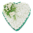 Classic heart-shaped funeral tribute featuring a dense bed of white chrysanthemums, their small, rounded petals arranged so tightly that they create a soft, uniform cushion of blooms across the full heart. The flowers are fresh and luminous, giving off the impression of calm and purity as they rest against a crisp white background. Encircling the entire heart is a beautifully pleated emerald green satin ribbon, folded into gentle scallops that frame the design and add a touch of traditional elegance often favoured at local Oxford services. At the upper left curve sits a graceful accent arrangement: two fully opened white roses, their velvety petals unfurling in smooth spirals, nestle among smaller white blossoms that look like freesias or similar airy flowers. Deep green, glossy leaves and light, feathery foliage extend from this cluster, with some stems drifting lightly across the chrysanthemum base to introduce a natural, garden-like feel. The heart as a whole conveys a quiet, steady tenderness - the sort of tribute you might see at a funeral in an Oxford church near the High Street, or placed with care beside a graveside in Rose Hill or Yarnton. It suggests a final, loving embrace expressed through flowers, ideal for families wishing to honour a life with dignity, simplicity, and a sense of peaceful remembrance during services, wakes, or private memorial gatherings.