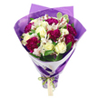 A carefully crafted bouquet of fresh flowers stands upright against a plain white background, like a thoughtful gift waiting to be delivered to a townhouse near Jericho in Oxford. The composition centres on creamy white roses, each bloom layered with velvety petals that curl inward, giving a sense of purity and quiet sophistication. Intermingled with the roses are generous clusters of deep magenta carnations, their densely packed, frilled petals creating a plush, almost cushion-like texture that brings warmth and intensity to the design. Delicate white alstroemeria, also known as Peruvian lilies, peek out between the larger flowers, their narrow petals softly marked with pinkish-red streaks and crowned with dark stamens, adding subtle pattern and fine detail. Around the blooms, fresh green leaves spread and curve, some smooth and solid in tone, others edged with gentle variegation, creating depth and the impression of a freshly gathered garden bouquet. The flowers form a rounded, dome-like shape at the top, then taper into a neat bundle of stems below. An inner ring of crisp white wrapping paper encircles the flower heads, acting as a bright, protective collar. Over this layer, a translucent purple cellophane or tissue is wrapped, its gently crinkled surface catching the light and adding a soft sheen, as if the bouquet were ready for an evening celebration on an Oxford college quad. At the base, an iridescent lime-green satin ribbon is tied into a neat, glossy bow that holds everything securely, with a small, rectangular, light brown gift tag hanging down, blank and inviting a personal message. The overall feel is joyful, polished, and lovingly arranged.